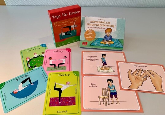 Spielkarten mit verschiedenen Übungsanleitungen